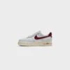 WMNS Nike Air Force 1 ‘07 SE (Photon Dust/Team Red)